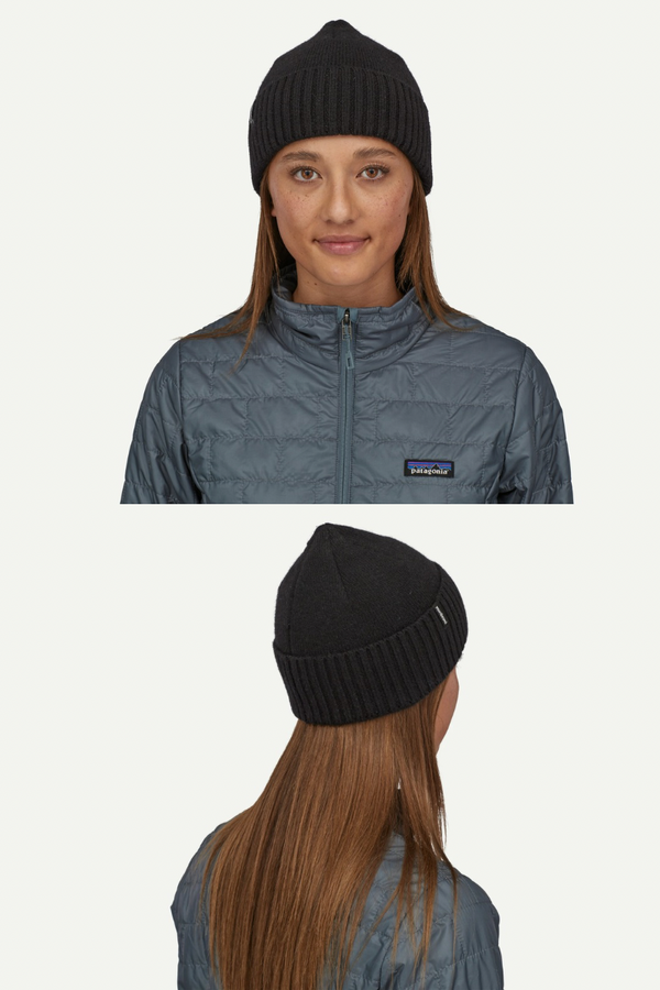 Person wearing a black beanie and gray jacket with Patagonia logo on a white background