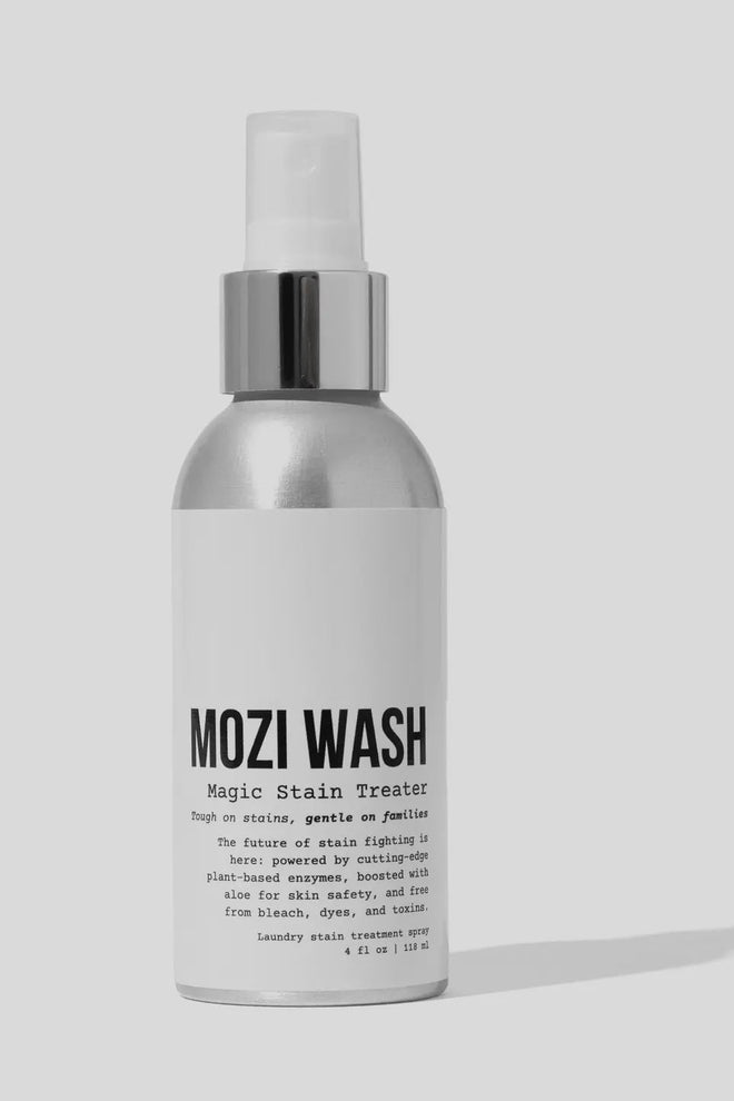MOZI WASH bottle on a light gray background