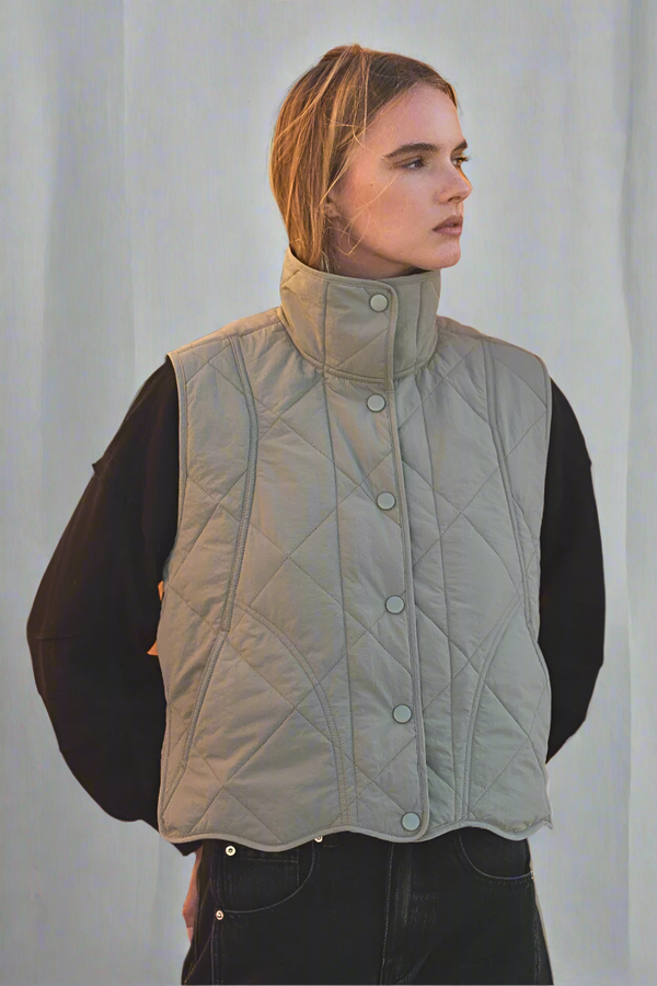 Wave Hem Quilted Vest
