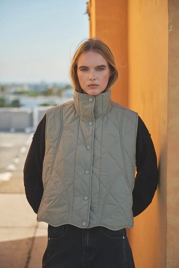 Wave Hem Quilted Vest